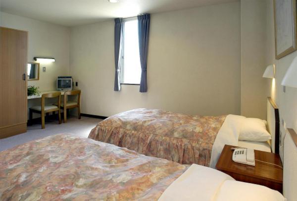 Business Hotel Prince Takamacu Szoba fotó